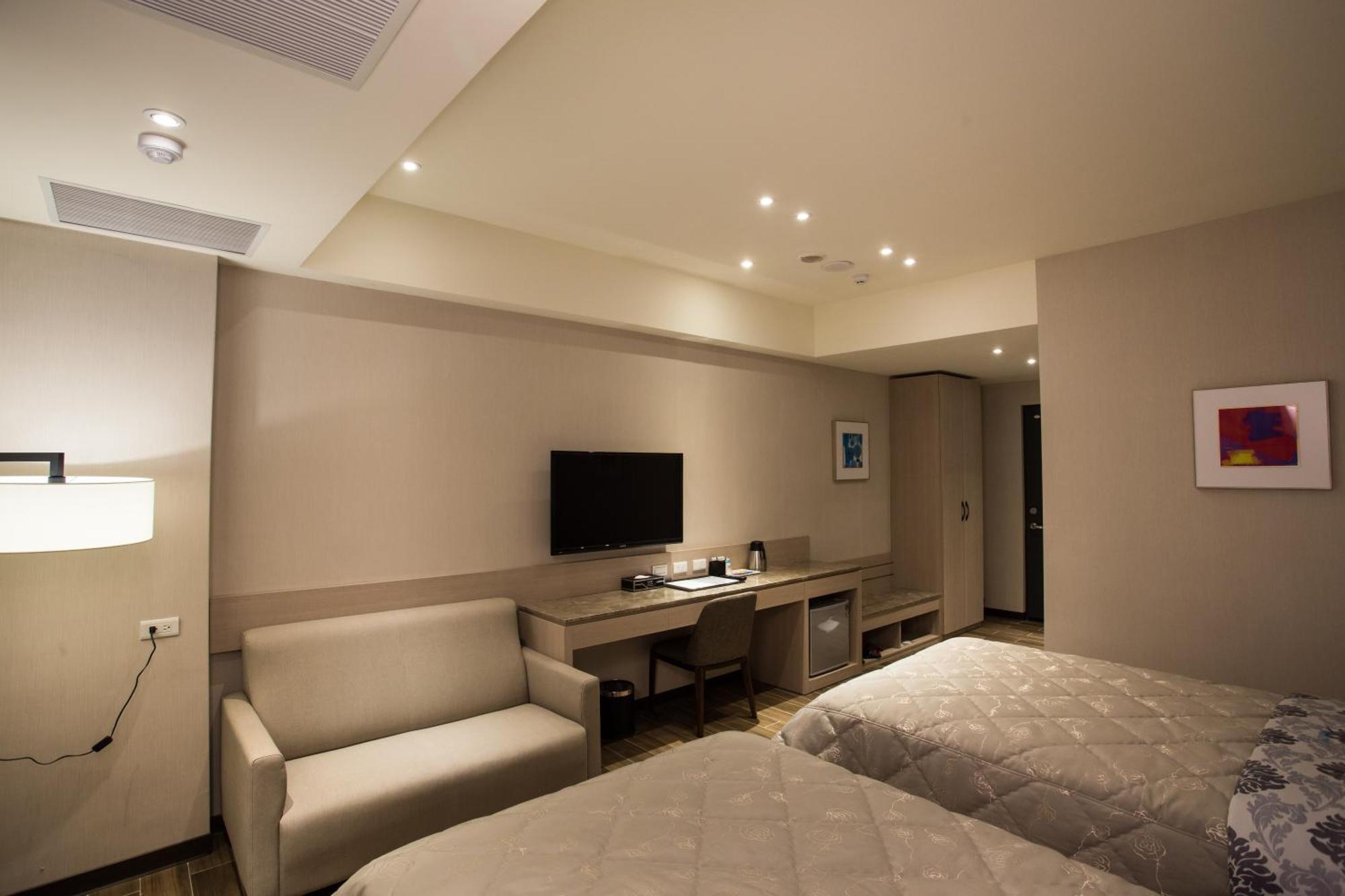 Verygood Business Hotel Huatan Quarto foto