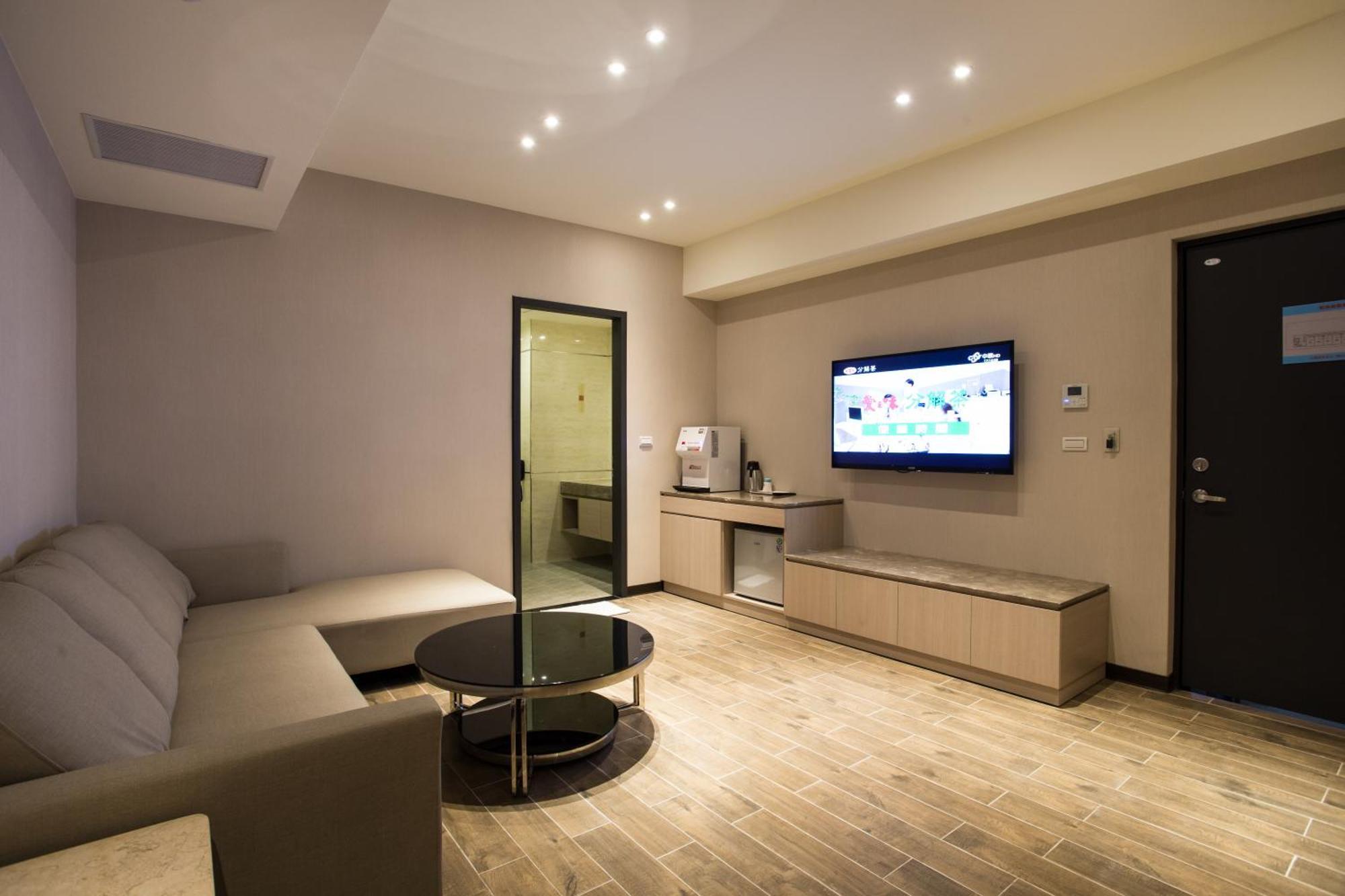 Verygood Business Hotel Huatan Quarto foto