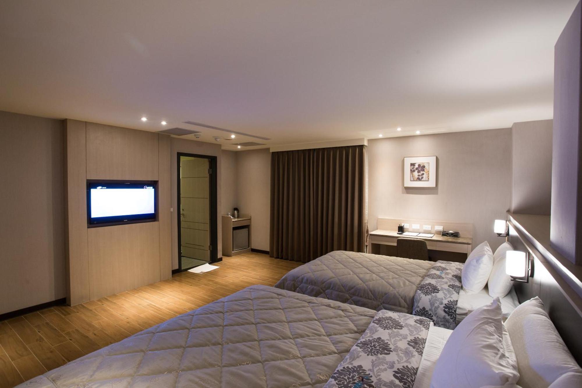 Verygood Business Hotel Huatan Quarto foto