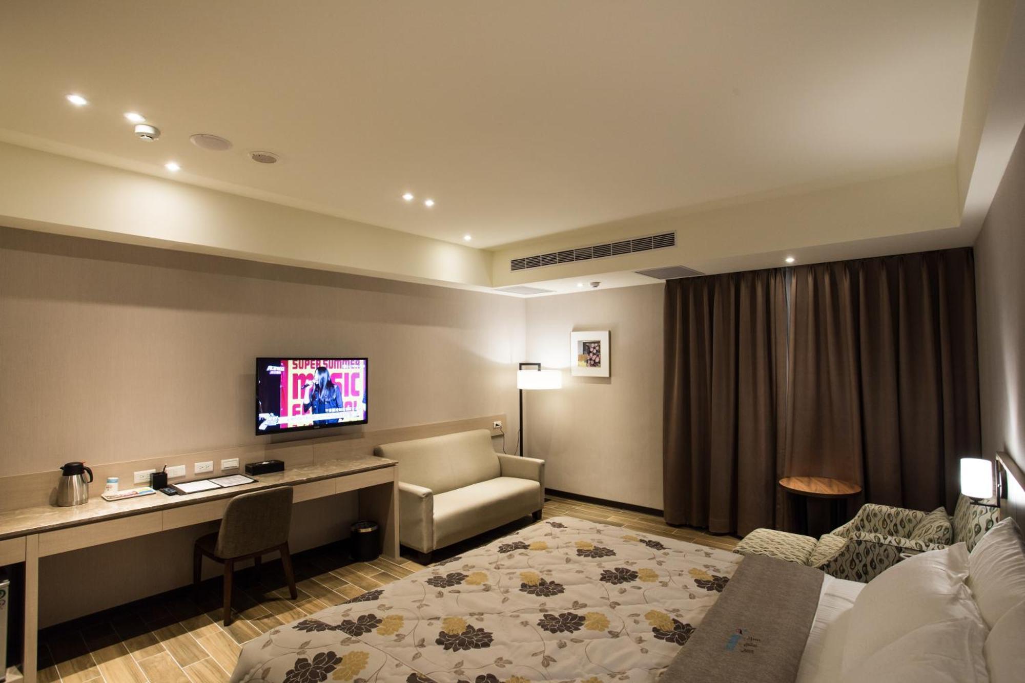 Verygood Business Hotel Huatan Quarto foto