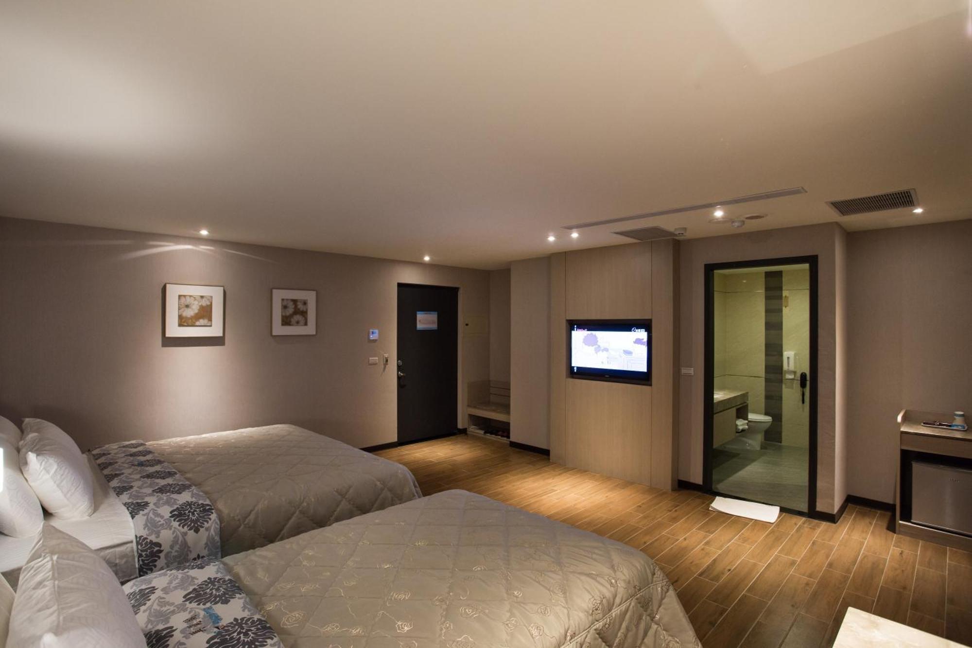 Verygood Business Hotel Huatan Quarto foto