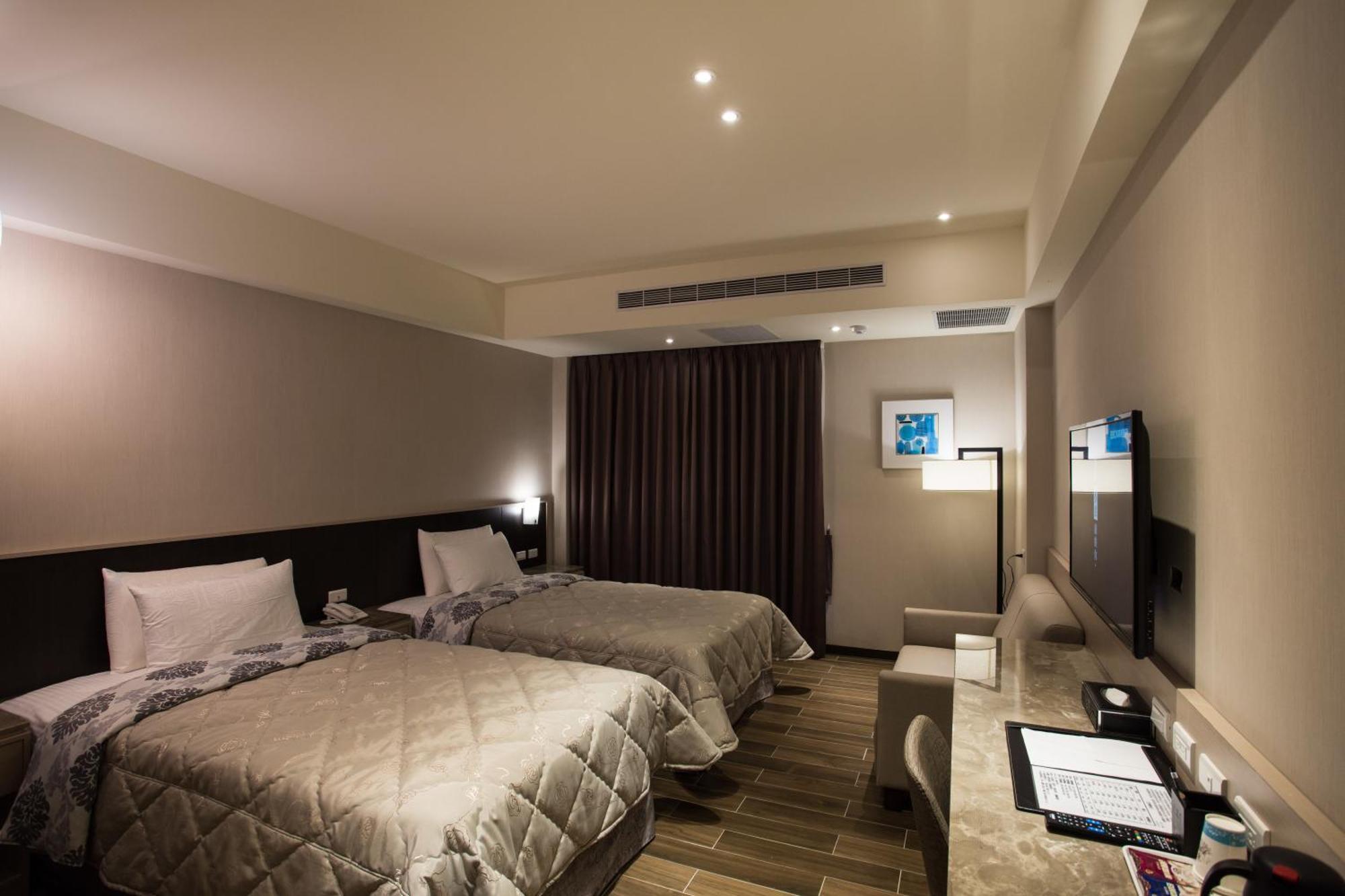 Verygood Business Hotel Huatan Quarto foto