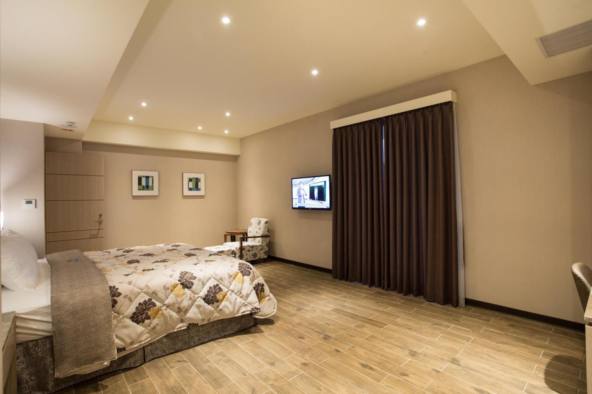 Verygood Business Hotel Huatan Quarto foto